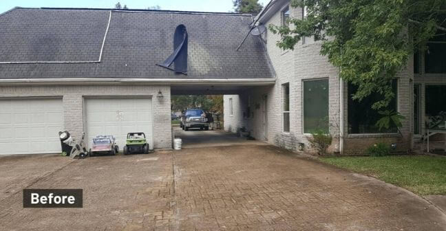 before photo of a house in magnolia texas before replacing roof and power washing