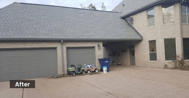 after photo of house in magnolia texas with new roof, exterior paint job and pressure washing on the house and driveway