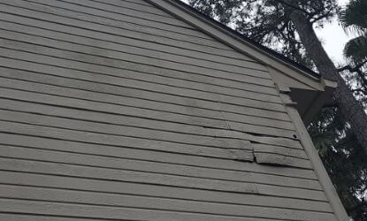 Rotted wood home siding in The Woodlands Texas