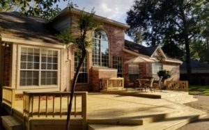 custom build exterior deck with refinishing in The Woodlands, Texas