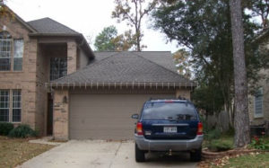 exterior garage door painting in The Woodlands Texas