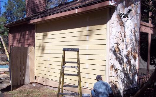 installed new hardie siding along with caulking and painting