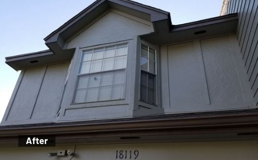 new exterior painting job on front of house in Tomball Texas