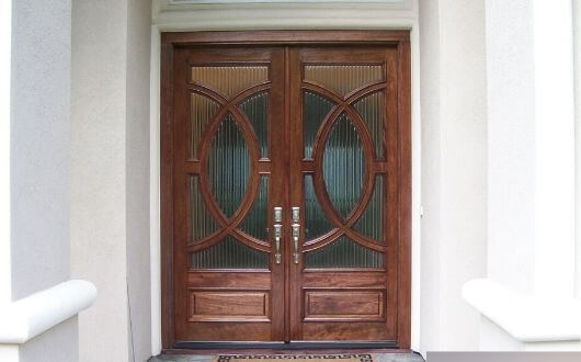 new front wood refinished and replacement of front door in The Woodlands TX
