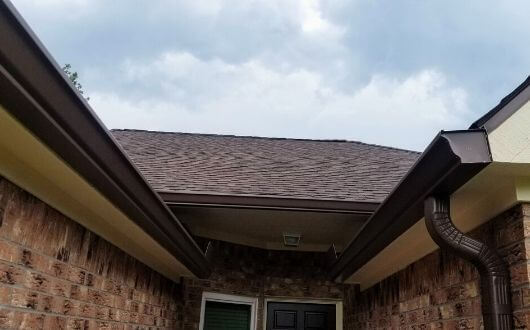 new seamless gutters along with a new roof install in The Woodlands Texas