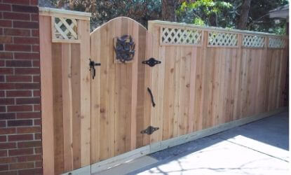 new treated wood fence with custom build