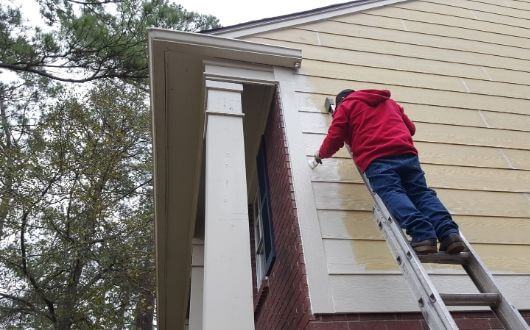 painting the exterior siding after Hardie Plank siding installation