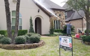 pressure washing house in The Woodlands Texas
