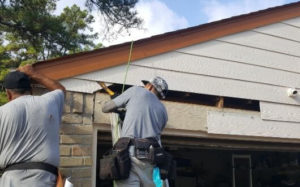 siding repair on the rotted wood in The Woodlands, Texas