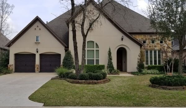 pressure washed house and new exterior house painting in The Woodlands, TX