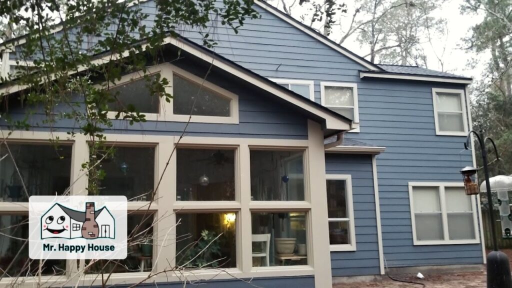 Exterior house painting with hardie siding in The Woodlands